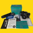 BRAND NEW - Olympus OM40 Program Black 35mm SLR Film Camera with Olympus Prime Lens Fashion