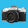 Olympus OM 30 35mm SLR Film Camera with Original Olympus 50mm Prime Lens Online now