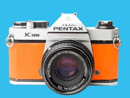 Pentax K1000 Orange Leather Vintage SLR 35mm Film Camera with Pentax f 2 50mm Prime Lens. Sale